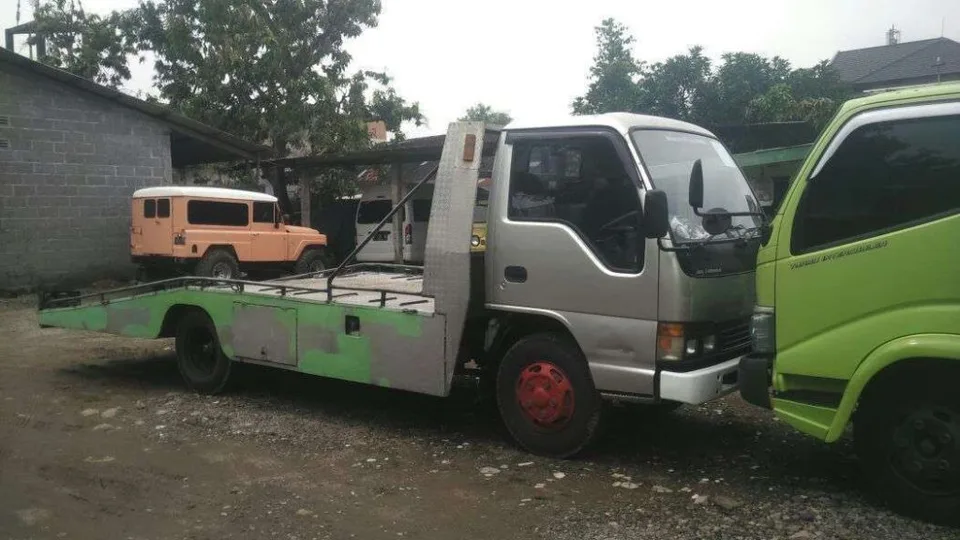 Towing mobil mewah dan sport car antar kota Jawa Bali